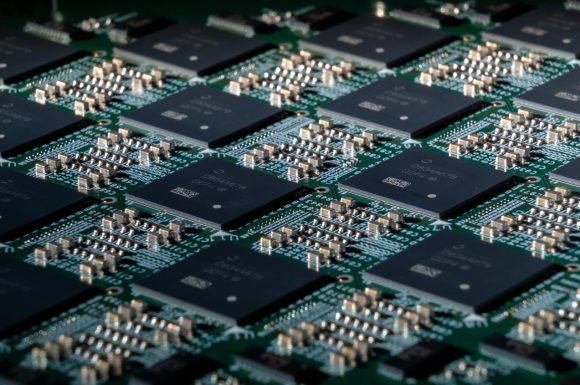 The Download: glass chips and “AI-free” logos